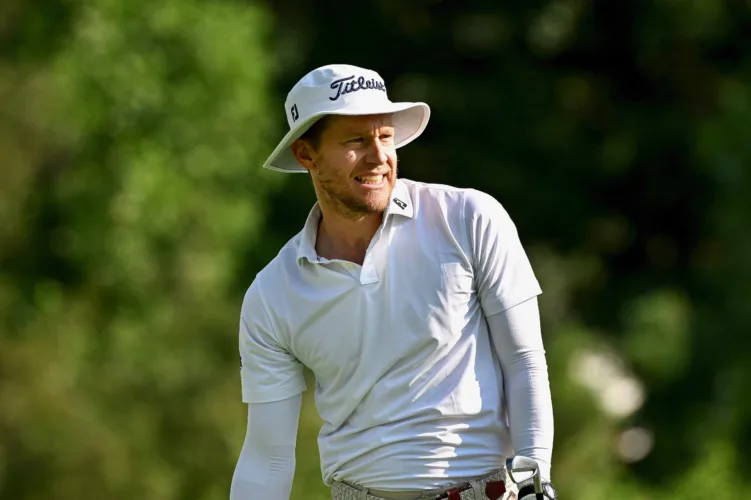 Malnati shoots 61 to take lead at Rocket Classic